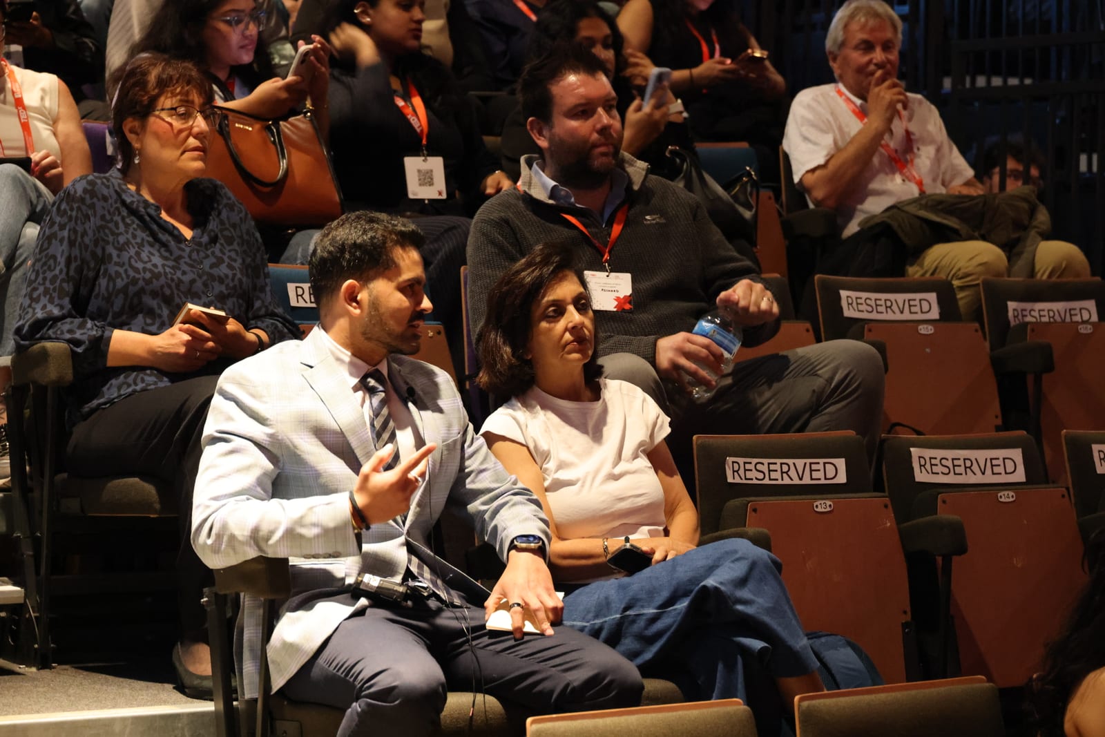 Audience members seated in the Riley Smith Theatre